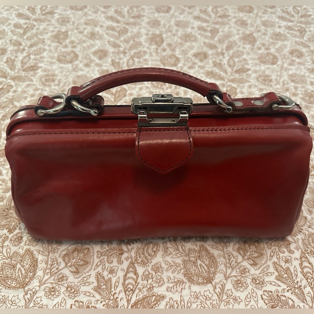 Cecile & Jeanne red leather handbag.